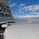 A detail of the Ford Trimotor (NC8407) showing the corrugated metal skin and exposed control cables. (Tim Shaffer)